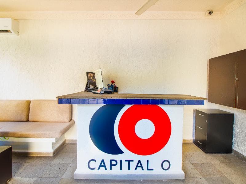 Capital O Hotel Parotas 3
