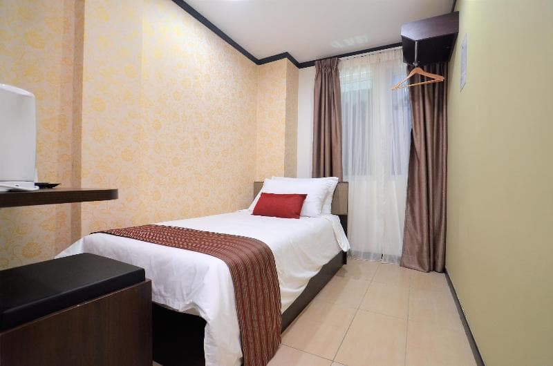 Capital O 90841 New One Enigma Hotel 5